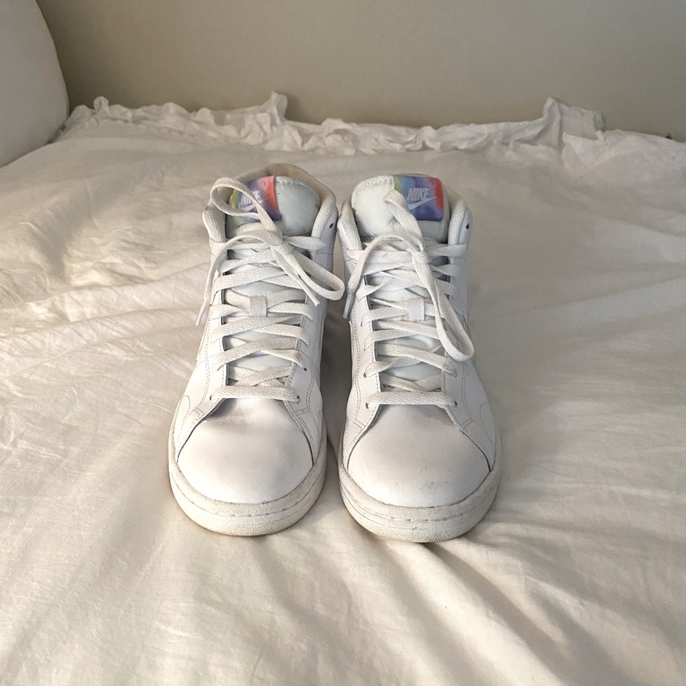 White Nike high-tops with tie-dye swoosh